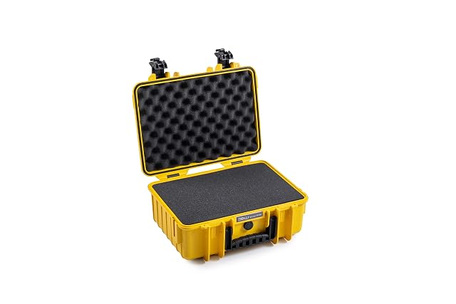 Valise B&W International Type 4000 jaune ouverte sur ses couches de mousse en cubes