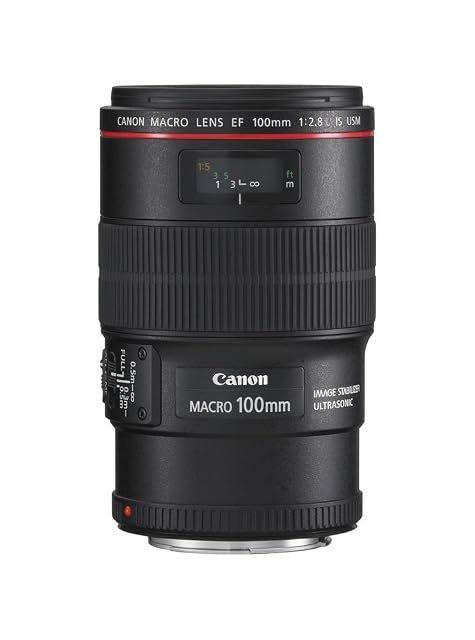 Objectif macro Canon EF 100mm L IS noir, avec sa bague rouge L et son inverseur de limiteur de plage